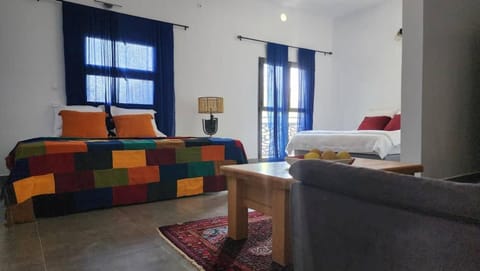 Bed, Seating area, Bedroom