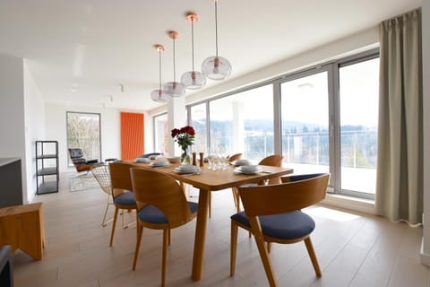 Day, View (from property/room), Living room, Seating area, Dining area