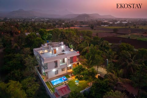 Property building, Nearby landmark, Natural landscape, Bird's eye view, Mountain view, Pool view, Swimming pool, Sunrise, Sunset