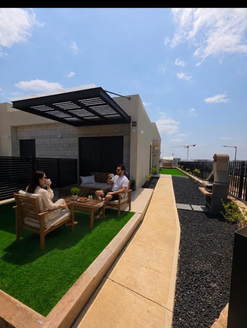 Property building, BBQ facilities, Seating area, acessibility