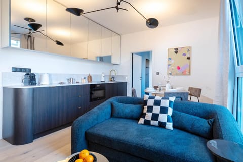 Kitchen or kitchenette, Living room, Seating area, Dining area