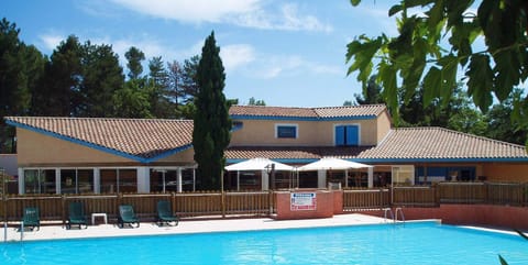 Property building, Living room, Swimming pool