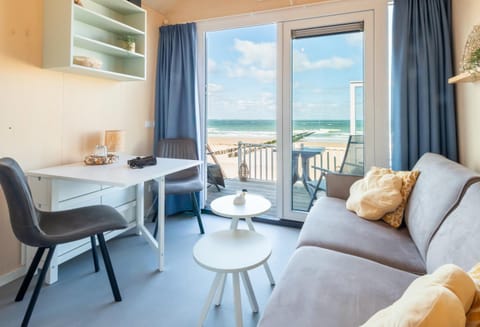 Natural landscape, View (from property/room), Balcony/Terrace, Living room, Seating area, Dining area, Sea view