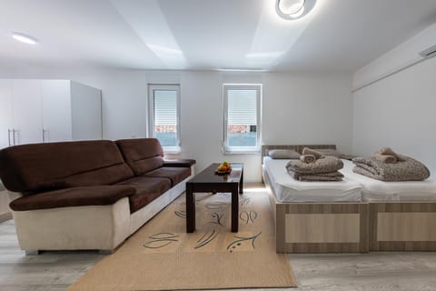 Bed, Living room, Seating area, Bedroom, towels