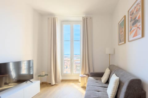 TV and multimedia, Living room, Seating area, City view, Sea view