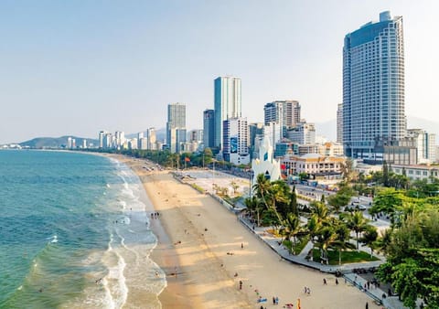 Property building, Nearby landmark, Day, Natural landscape, Beach, City view, Sea view