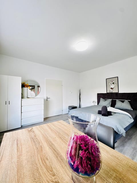Bed, Seating area, Bedroom, towels, wardrobe
