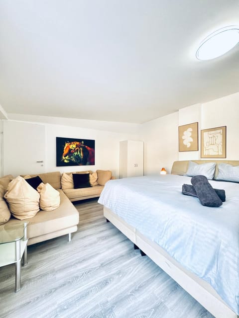 Property building, Bed, Seating area, Bedroom, towels