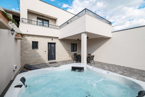 Property building, Patio, Day, Hot Tub, View (from property/room)