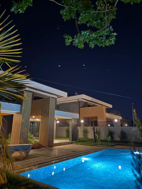 Property building, Night, Pool view, Swimming pool