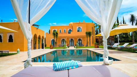 Property building, Day, View (from property/room), Pool view, Swimming pool, sunbed, towels