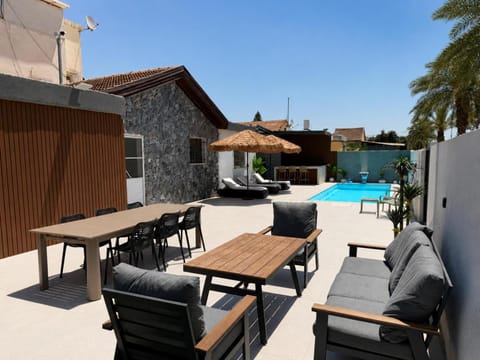View (from property/room), Seating area, Pool view, Swimming pool