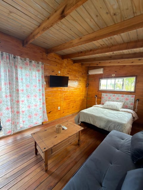 Communal lounge/ TV room, Bed, TV and multimedia, Living room, Photo of the whole room, Seating area, Bedroom