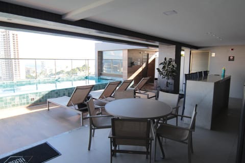Balcony/Terrace, Seating area, Dining area, Pool view, Swimming pool
