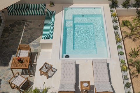 Patio, Day, Seating area, Pool view, Swimming pool, sunbed