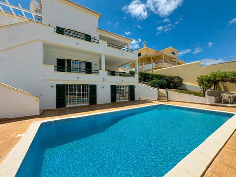 Property building, Pool view, Swimming pool, sunbed