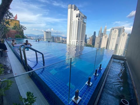 Property building, Day, Natural landscape, City view, Pool view, Swimming pool