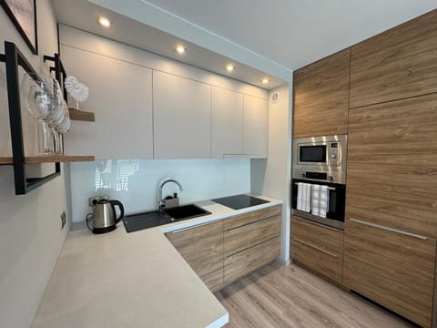 Kitchen or kitchenette, stove