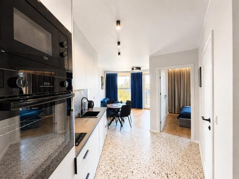 Communal lounge/ TV room, kitchen