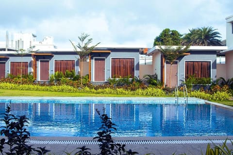 Property building, Day, Garden, View (from property/room), Swimming pool