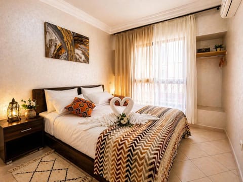 Bed, Photo of the whole room, Bedroom, towels, air conditioner