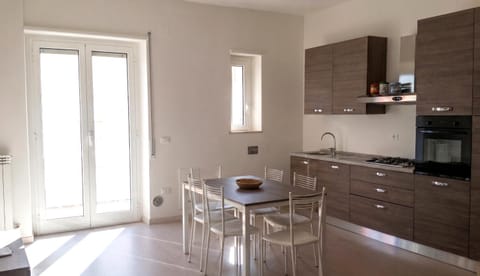 Kitchen or kitchenette, Living room, oven, kitchen