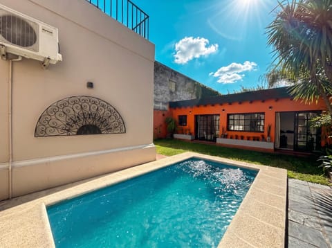Property building, Day, Pool view, Swimming pool, sunbed