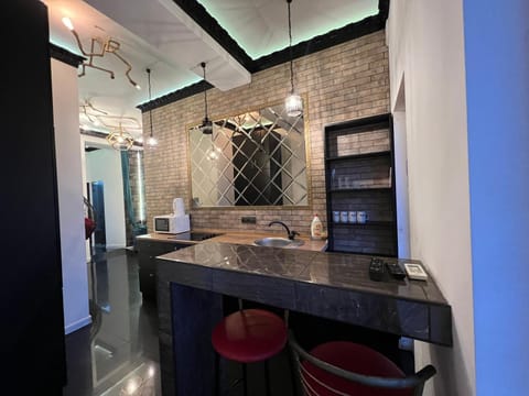 Kitchen or kitchenette, oven, stove