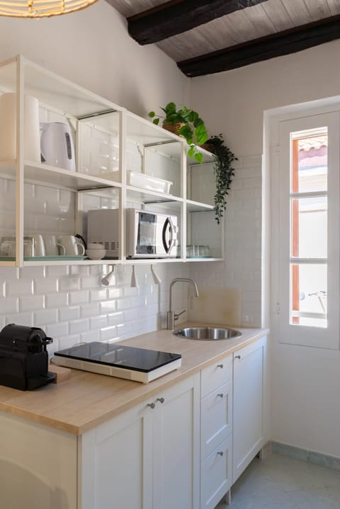 Kitchen or kitchenette, stove