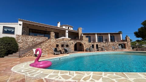 Property building, Living room, Swimming pool