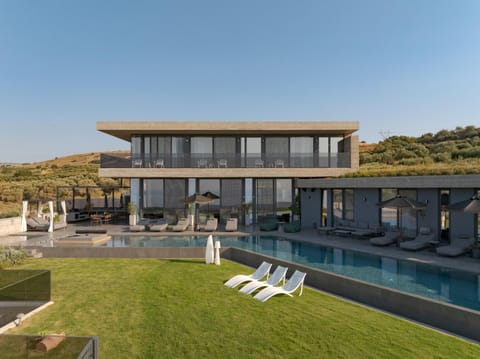 Property building, People, Property logo or sign, Garden, View (from property/room), Other, Seating area, Text overlay, Swimming pool, towels