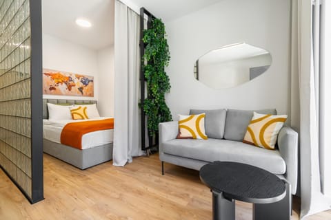 Bed, Living room, Seating area, Bedroom