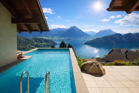 Nearby landmark, Day, Natural landscape, Lake view, Mountain view, Pool view, Swimming pool, sunbed