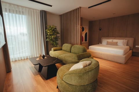 Bed, Living room, Seating area, Bedroom