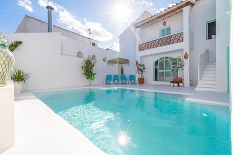 Property building, Living room, Swimming pool