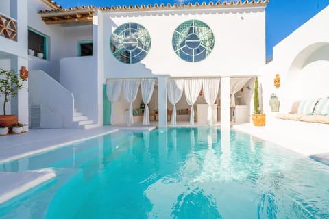 Property building, Living room, Swimming pool