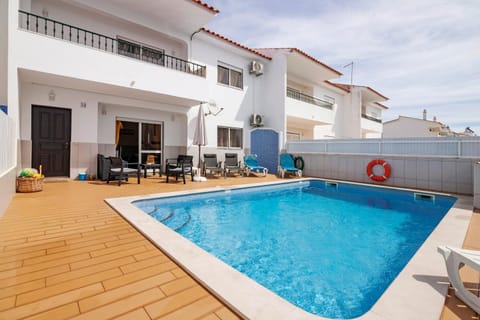 Property building, Living room, Swimming pool