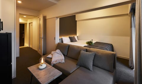 Bed, Living room, Seating area, Bedroom