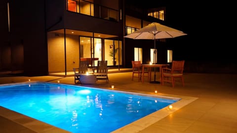 Property building, Night, Pool view, Swimming pool