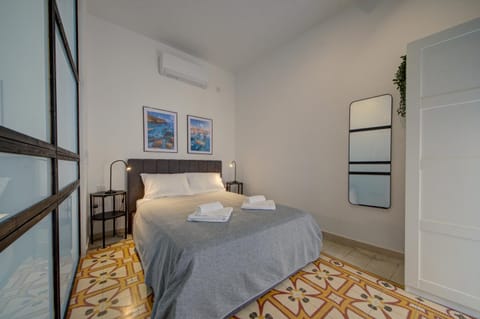Bed, Photo of the whole room, Bedroom, towels, air conditioner