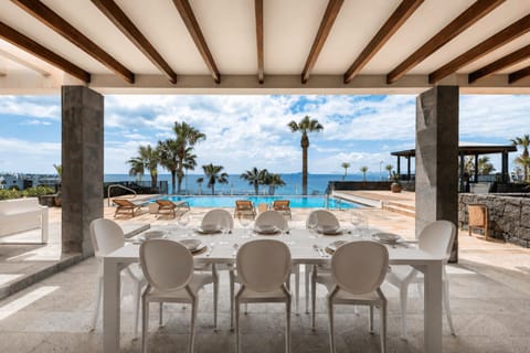 Patio, Dining area, Pool view