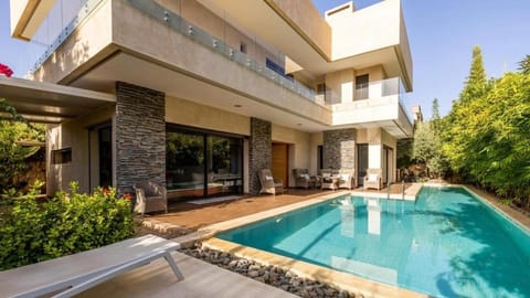 Property building, Patio, View (from property/room), Balcony/Terrace, Pool view, Swimming pool