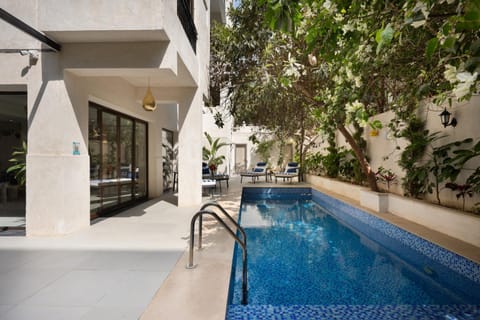 Swimming pool, sunbed
