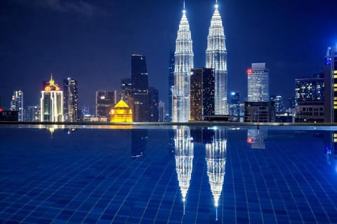 Property building, Nearby landmark, Night, Natural landscape, City view, Pool view, Swimming pool