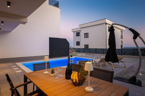 View (from property/room), Balcony/Terrace, Seating area, Swimming pool, sunbed