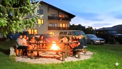 Property building, Night, People, Natural landscape, BBQ facilities, Garden, Evening entertainment, Guests, Garden view, group of guests