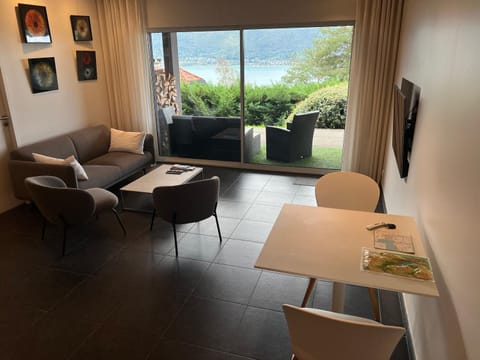Living room, Seating area, Dining area, Lake view, Mountain view