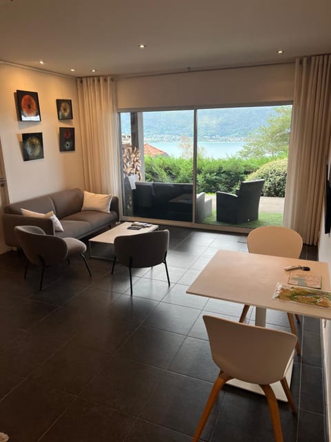 Natural landscape, Living room, Seating area, Dining area, Lake view, furniture