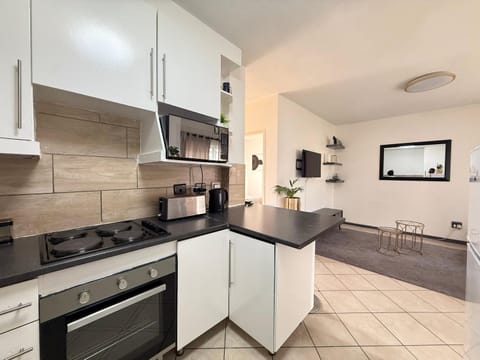 Kitchen or kitchenette, oven, stove, toaster