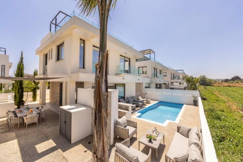 Property building, Patio, Day, Natural landscape, View (from property/room), Balcony/Terrace, Garden view, Pool view, Swimming pool, sunbed